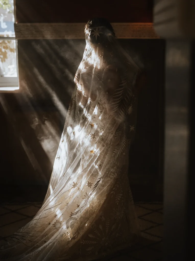 Bride in beautiful light, captured in a stunning portrait that highlights her elegance and grace.