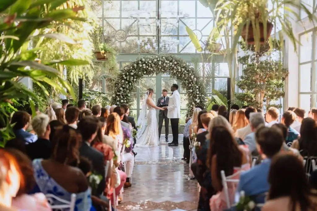 Bride and groom exchanging vows in Morocco, surrounded by a stunning scenic backdrop