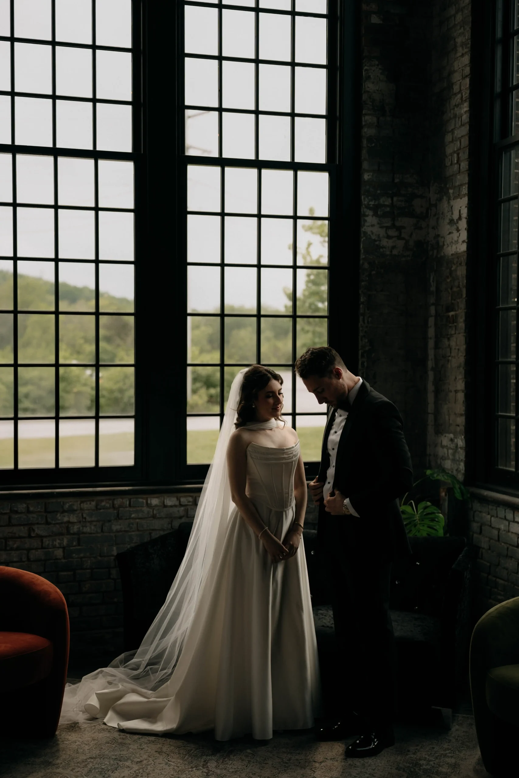 Romantic Bride and Groom at Sunset Bride and groom sharing a private moment in an industrial-style loft