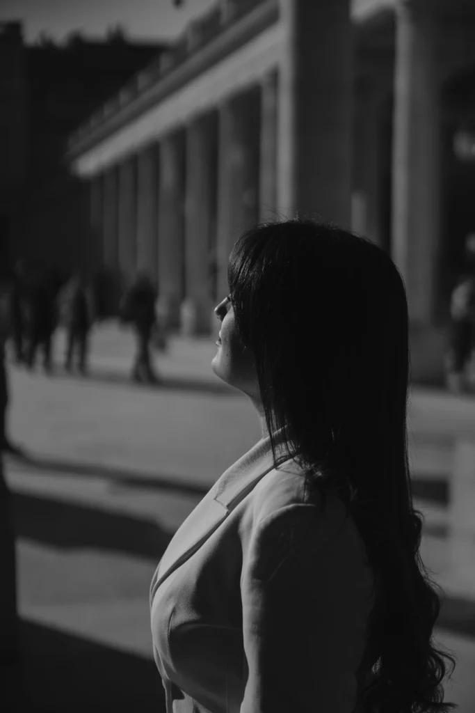 Bride in silhouette looking into the light in Paris.