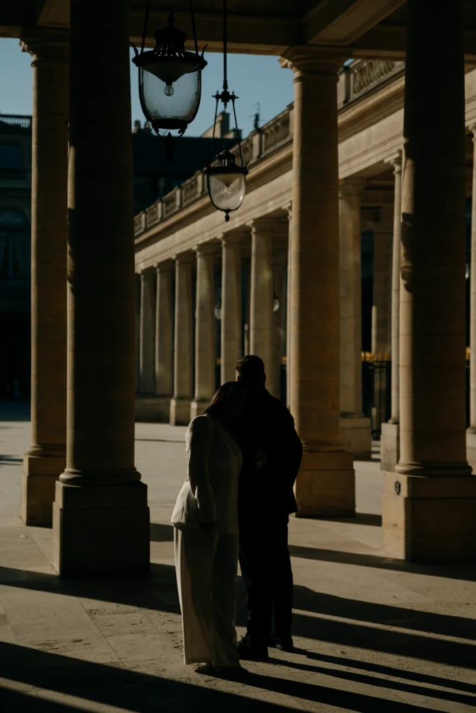 Intimate portrait of a bride in a white suit during a Paris elopement