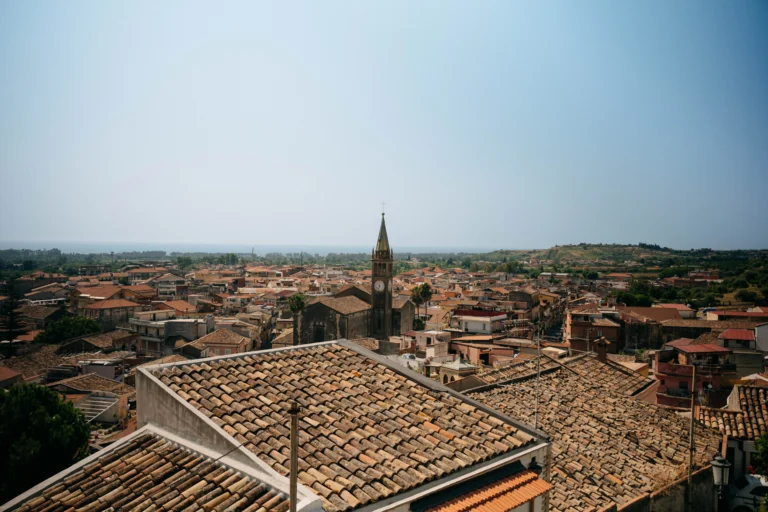 Aerial view over rooftops and church tower in Sicily