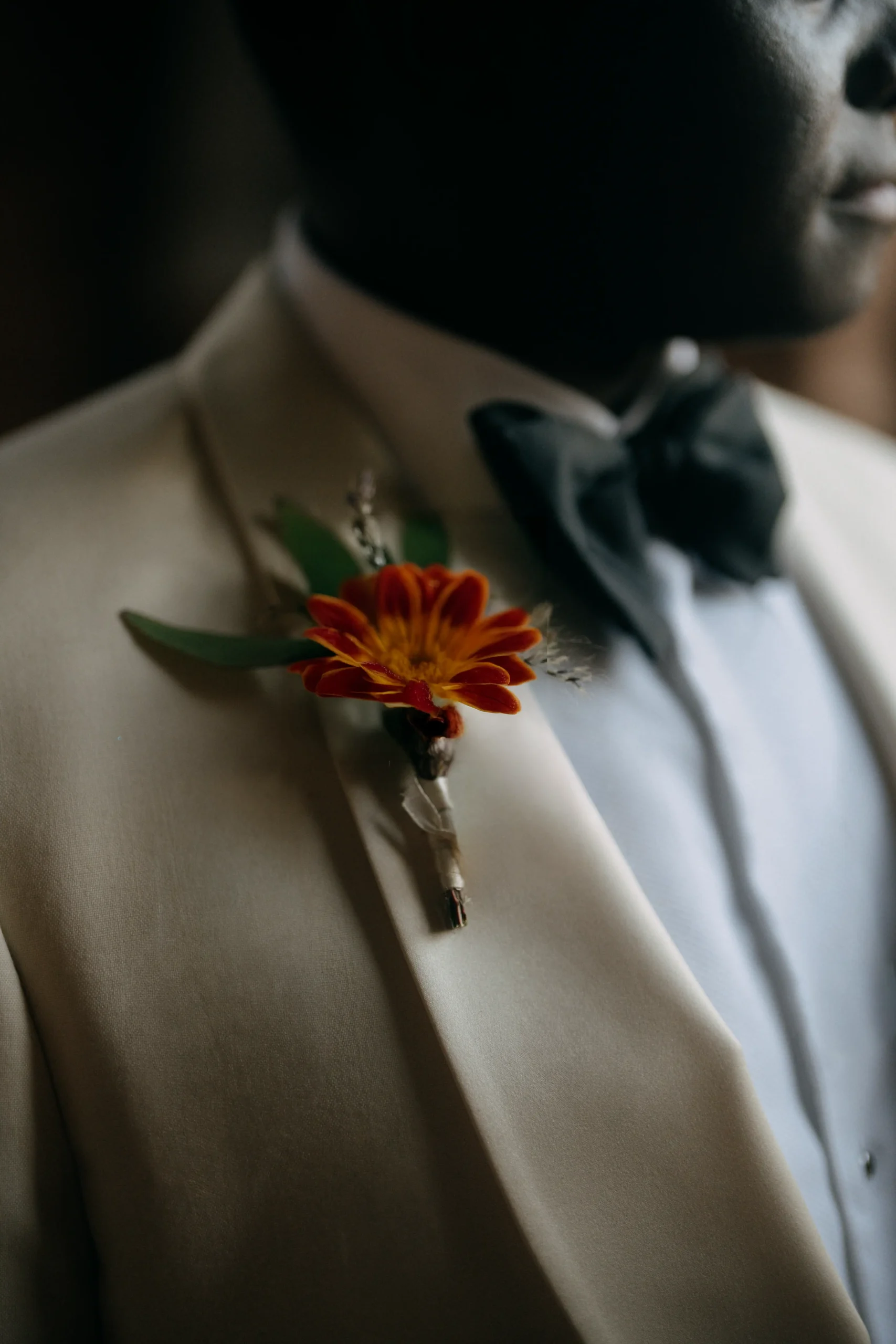 Close-up of the groom’s boutonniere during a cinematic wedding in Marrakech
