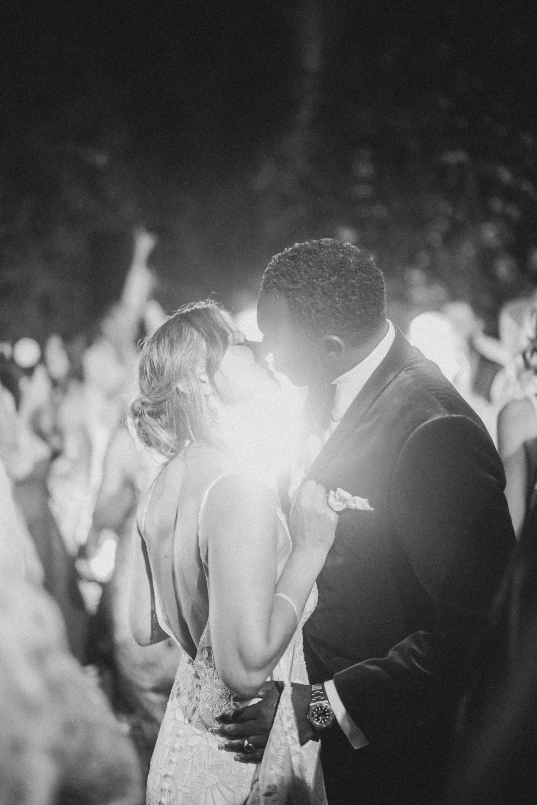 Bride and groom kissing during their wedding night in Marrakech.
