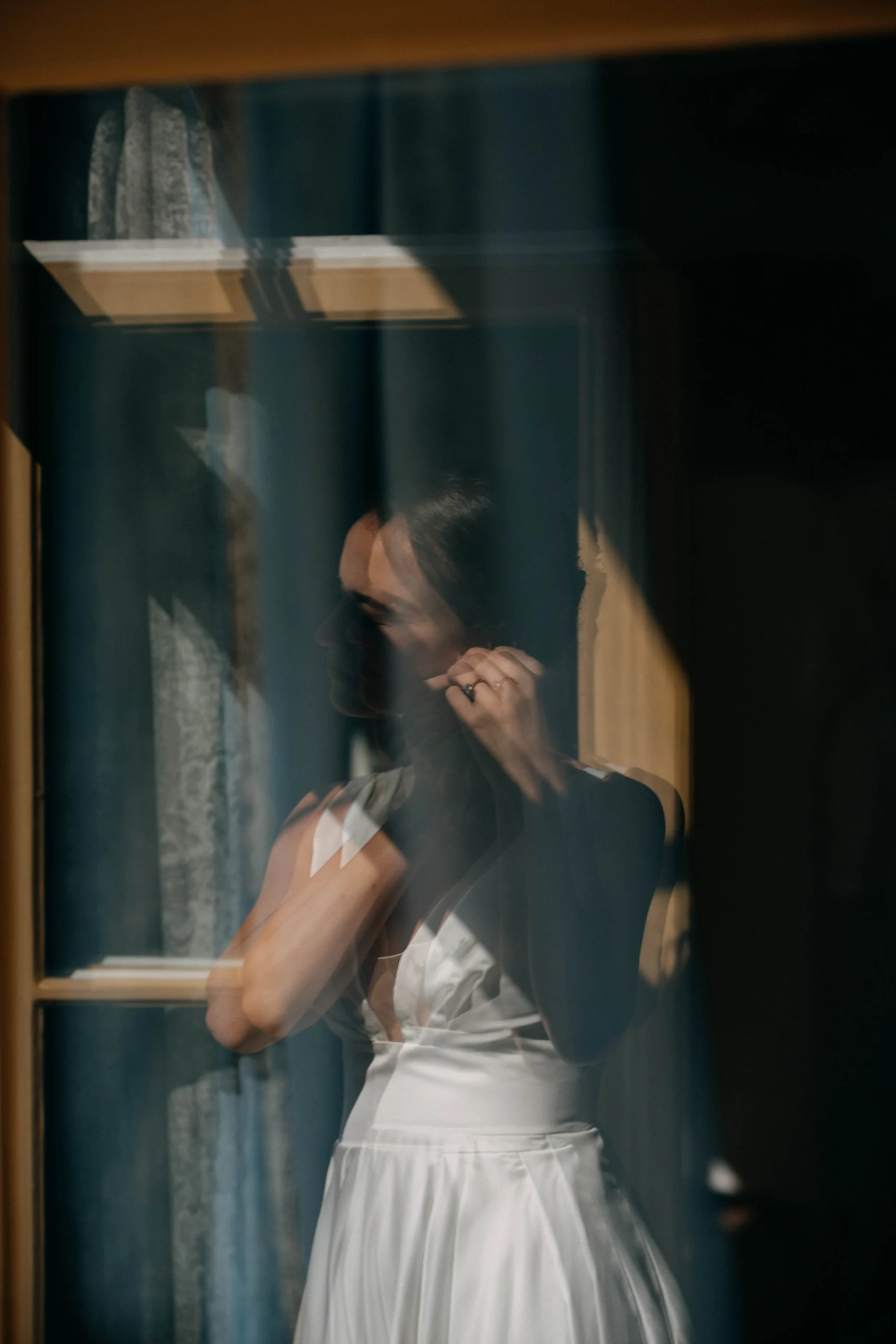 Sparkling bridal shoes on a ladder in dappled leaf light, Munich wedding at La Villa