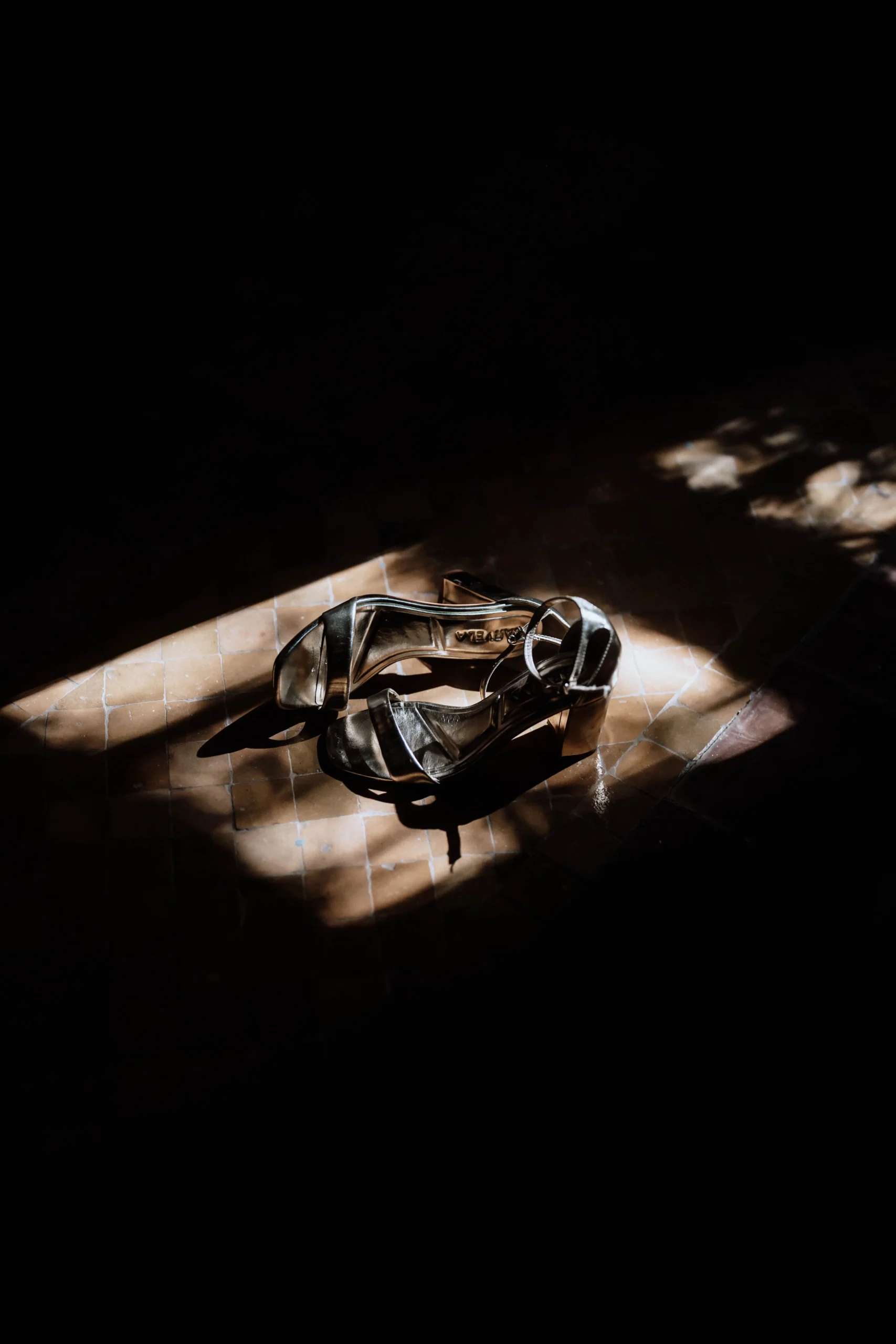 Bride wedding shoes in cinematic light photographed in Morocco