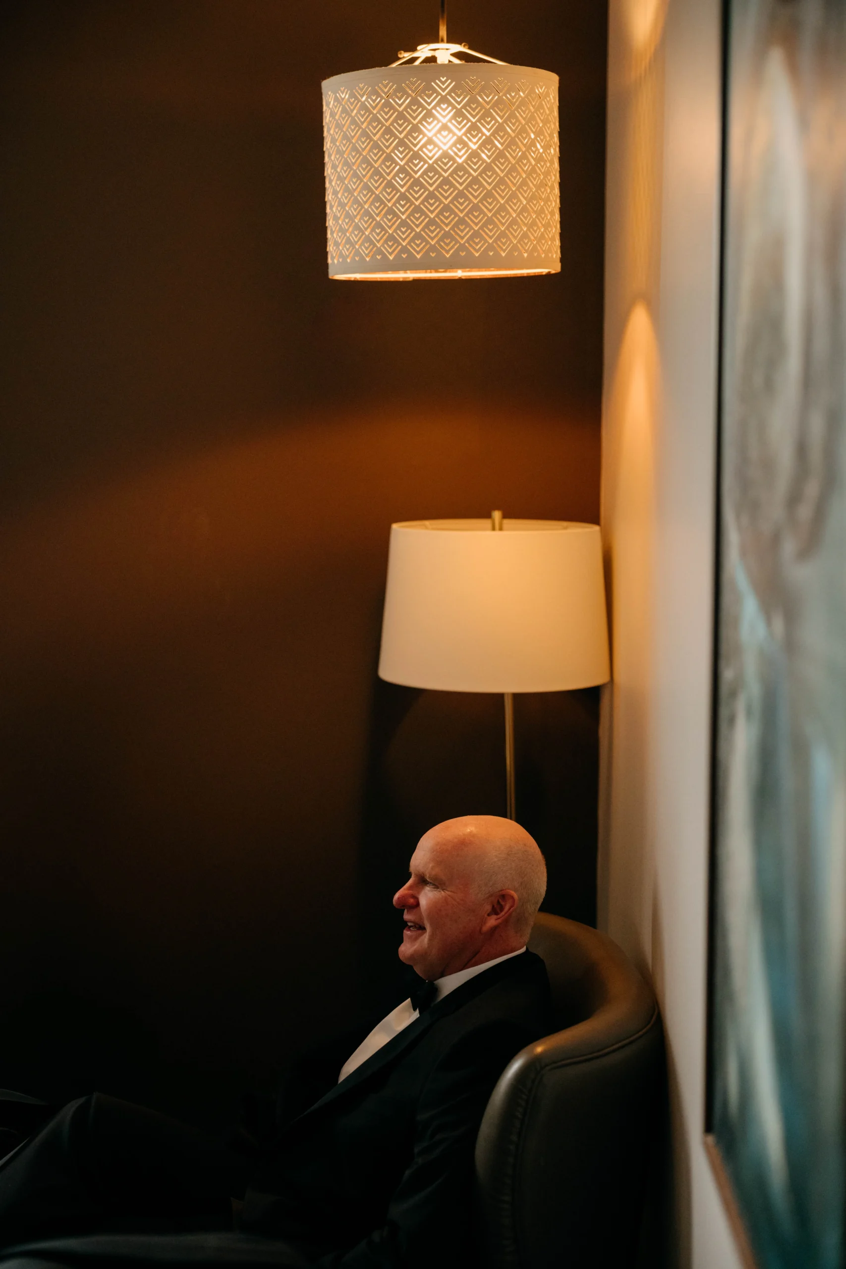 Wedding guest seated indoors at The Foundry NYC.