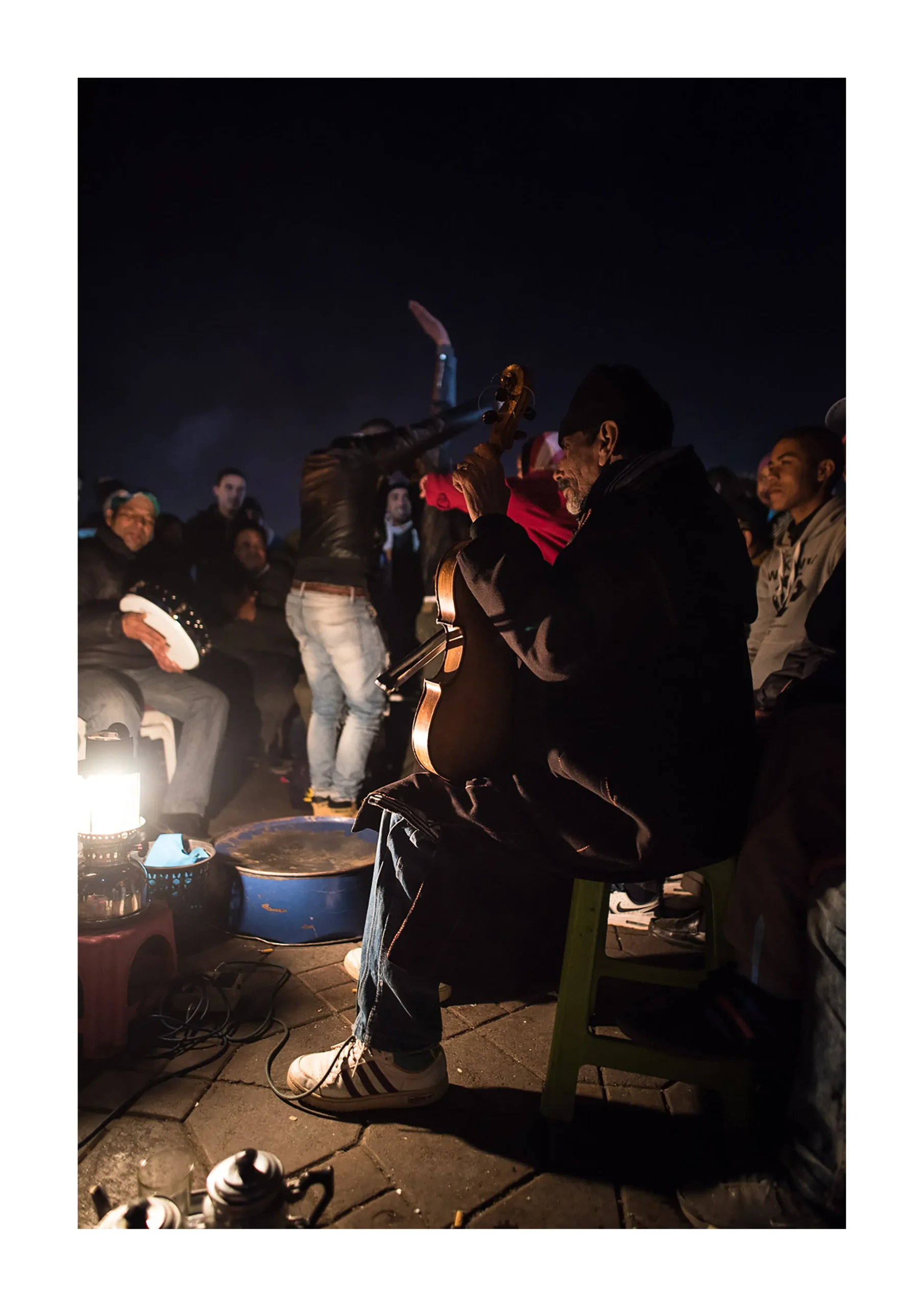 Marrakech fine art print of street musicians performing at night