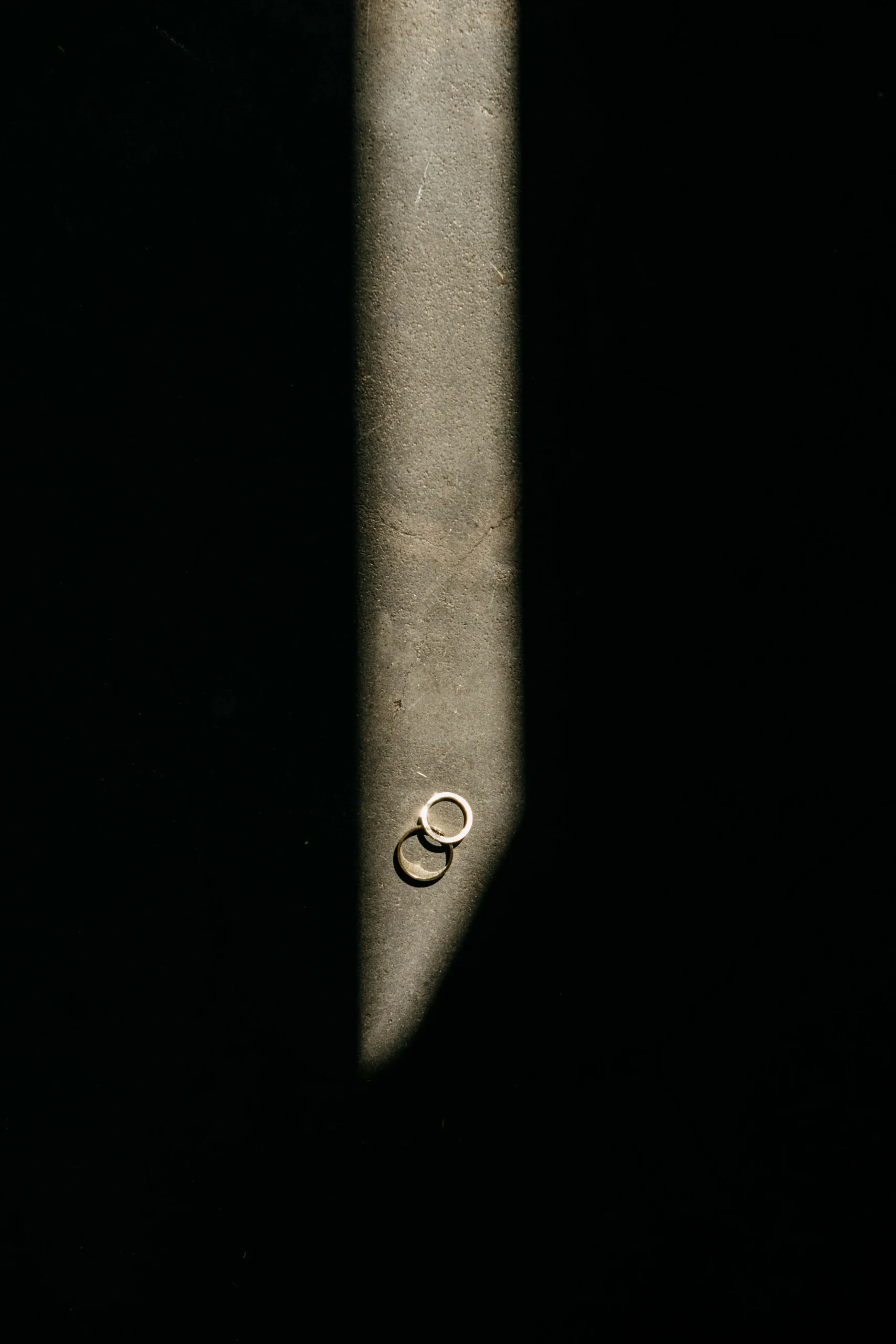 Wedding rings in dramatic light at The Foundry NYC