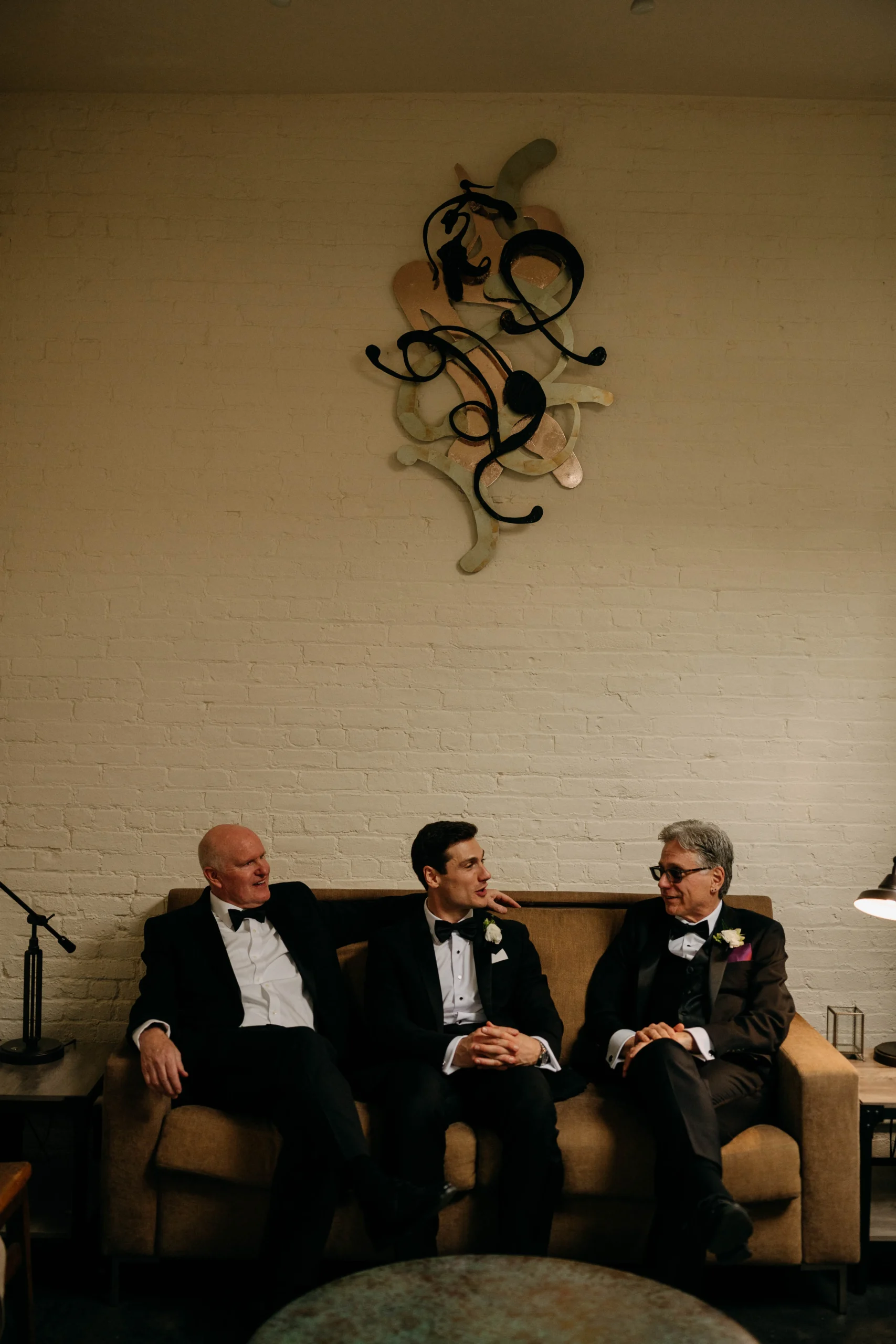 Groom with parents at The Foundry NYC wedding