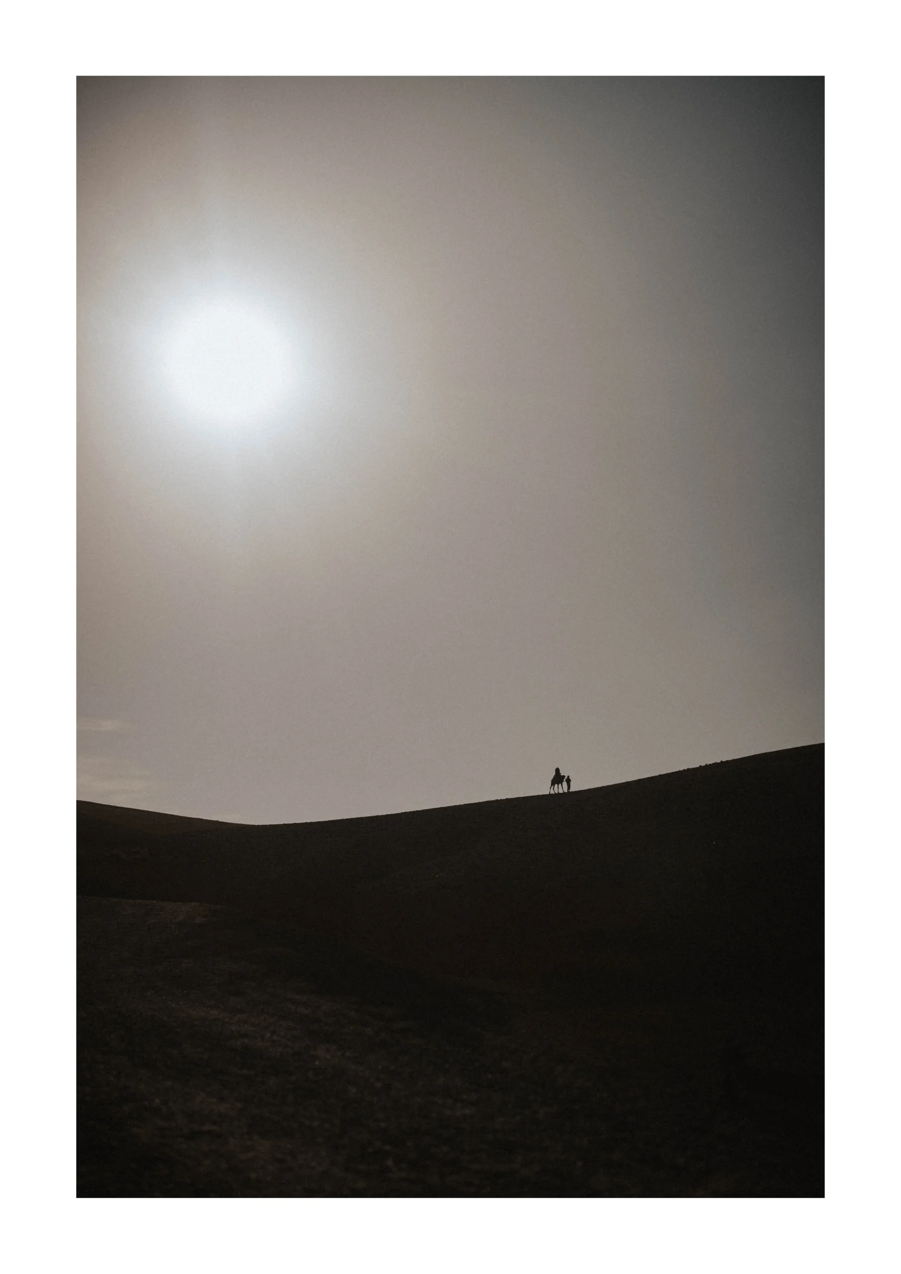 Marrakech fine art print of a distant figure walking across desert dunes